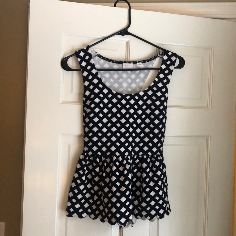 Black and white peplum tank top with scallop back